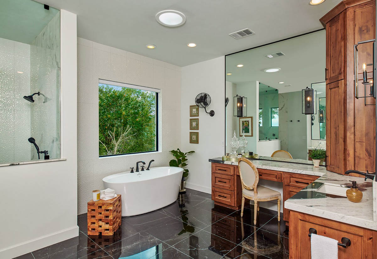 Custom home interior with built-in cabinetry and layered lighting